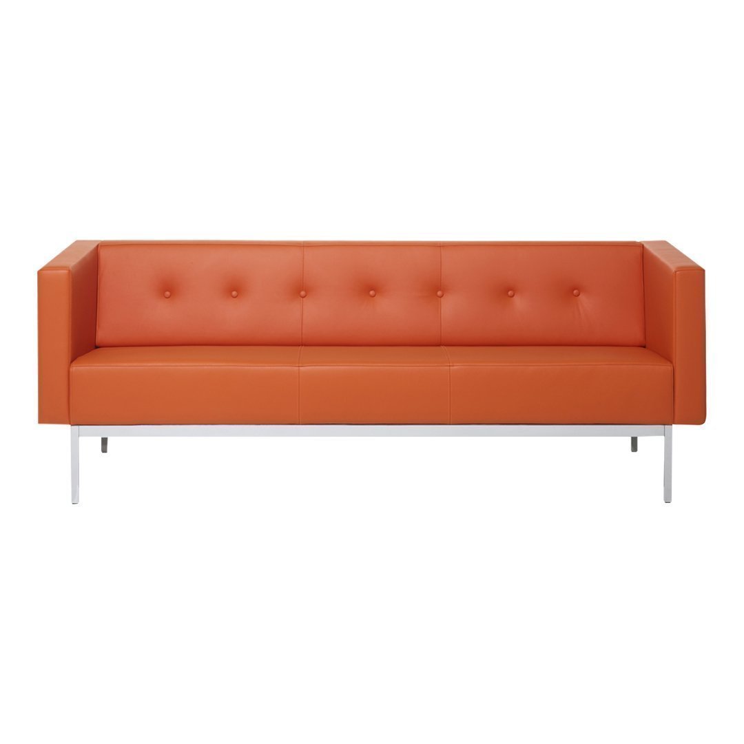 Modern orange leather sofa with button tufting and sleek chrome legs, perfect for contemporary living spaces.