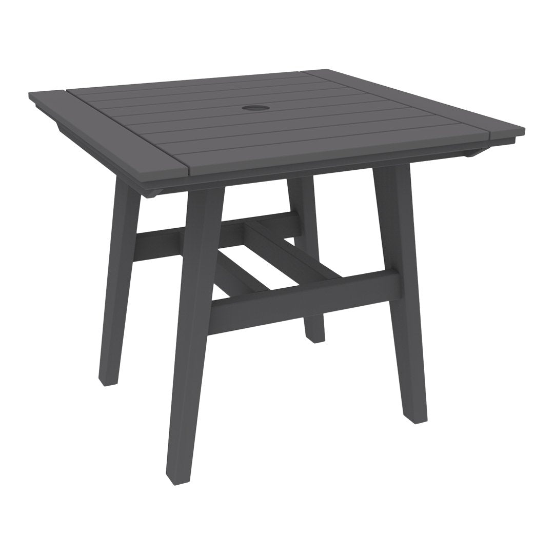 Square outdoor table in a sleek dark gray finish with a slatted top design and sturdy, minimalist legs.