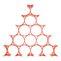 Orange geometric shelf design with circular cutouts, forming a unique triangular pattern. Stylish and modern decor.