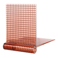 Transparent orange vinyl sheet with a grid pattern, ideal for crafting and DIY projects.