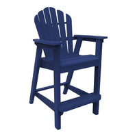 Navy blue adirondack chair with a classic slatted design and sturdy armrests, perfect for outdoor relaxation.