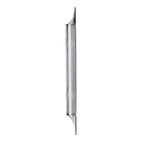Sleek silver vertical light fixture with a clear glass panel, minimalistic design, and modern aesthetic.