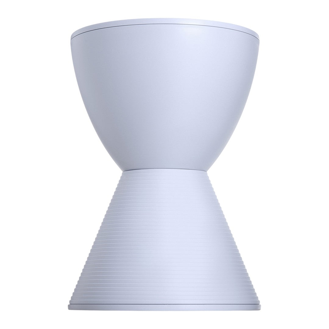 Light gray modern hourglass-shaped table with a smooth top and ribbed base design. Ideal for minimalist decor.