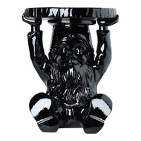 Glossy black ceramic gnome table with intricate detailing and a playful design, perfect for contemporary decor.