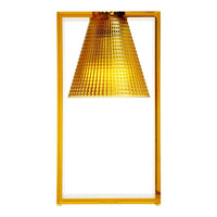 Yellow geometric-patterned lamp with a textured shade and sleek geometric frame. Perfect for modern decor.