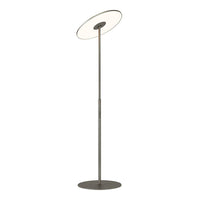 Sleek metallic floor lamp with a round white shade and smooth, minimalist design. Ideal for modern decor.