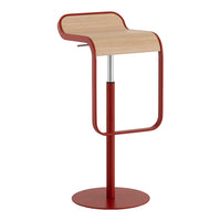 Red bar stool with a curved wood seat and a sleek metal base, featuring a minimalist design and warm tones.