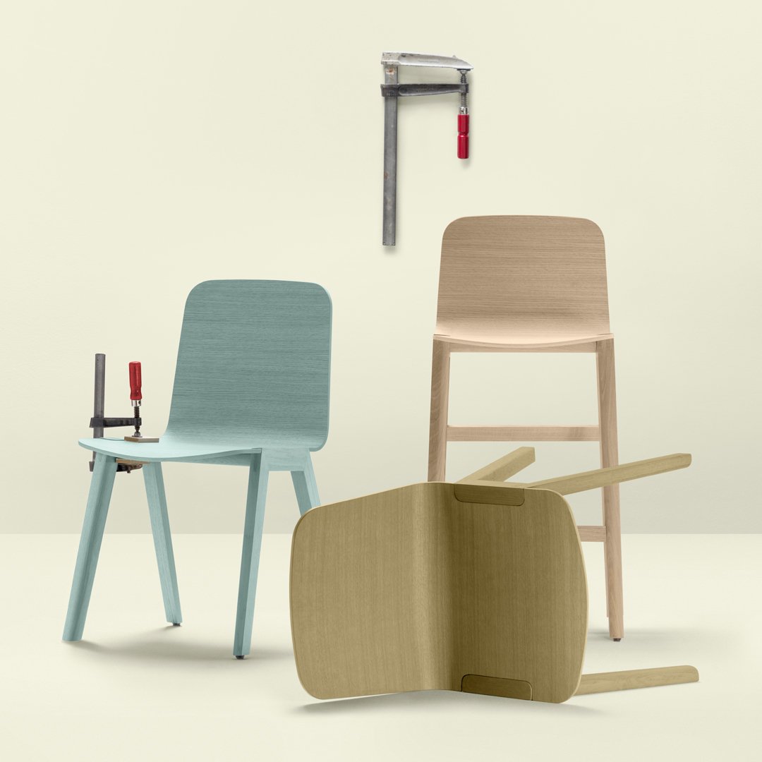 Colorful wooden chairs: light blue, natural wood, and soft beige with clean lines and modern patterns.
