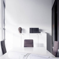 Sleek white office with black accents and a subtle pattern of light grey furniture for a modern, minimalist look.