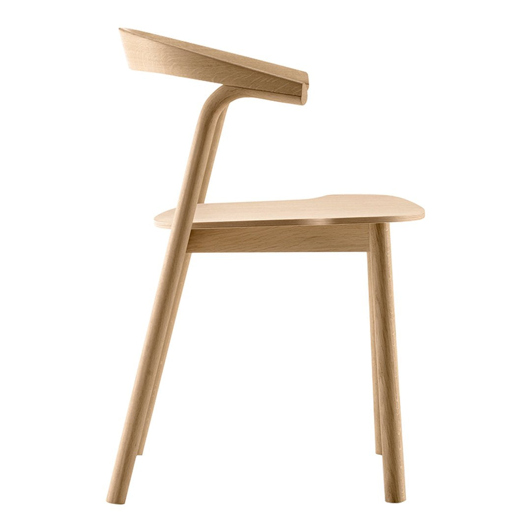 Natural wood chair featuring a smooth, light finish and minimalist design. Perfect for modern interiors.