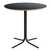 Black round table with a natural wood edge and a sleek black metal base, perfect for modern interiors.