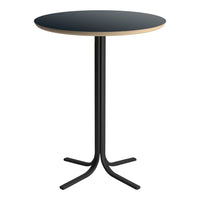 Black round table with a natural wood edge and a sleek black base, perfect for modern decor.