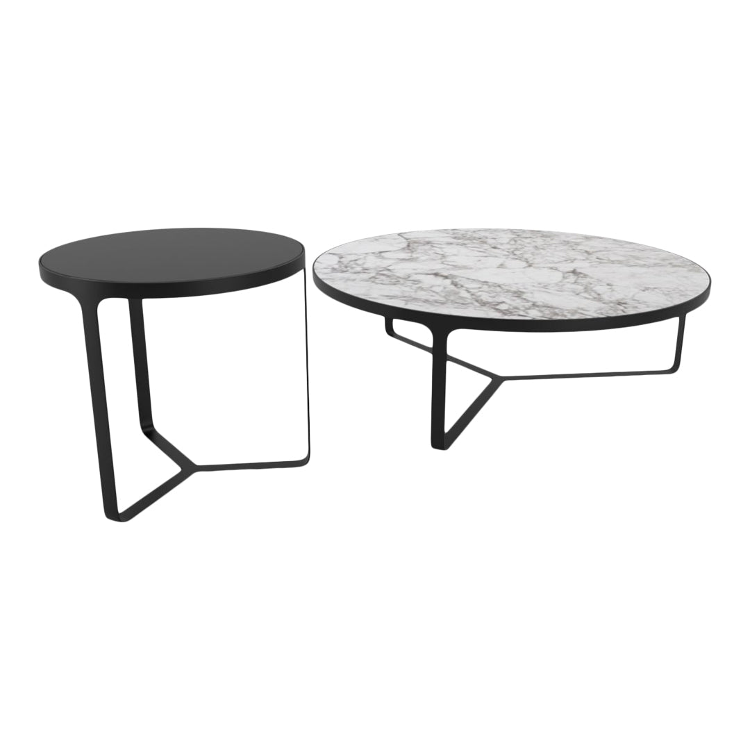 Two modern coffee tables: one with a sleek black finish, the other featuring a white marble top and black metal base.