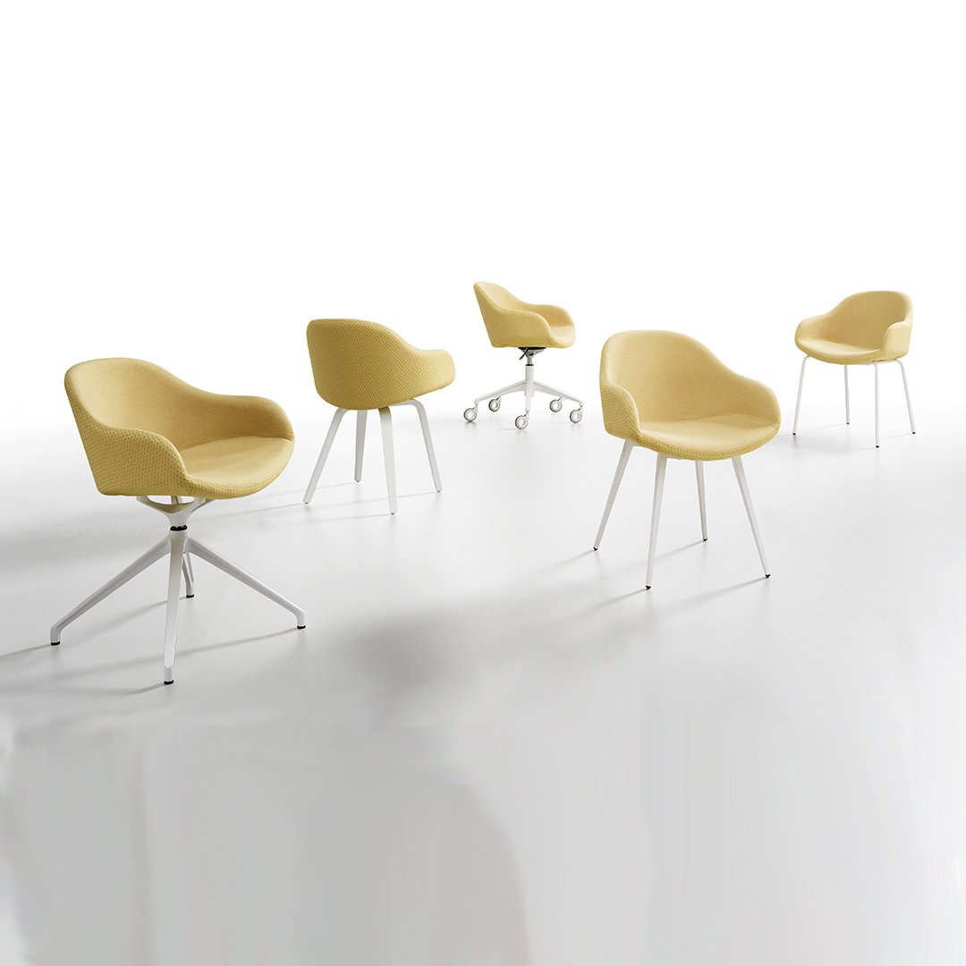 Set of five modern yellow chairs with smooth, curved seats on sleek metal bases. Elegant design and vibrant color.