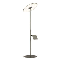 Sleek silver floor lamp with a circular shade and minimalist design. Modern and elegant for any room decor.
