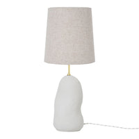 White sculptural lamp base with a beige textured shade, featuring a minimalist design perfect for modern decor.