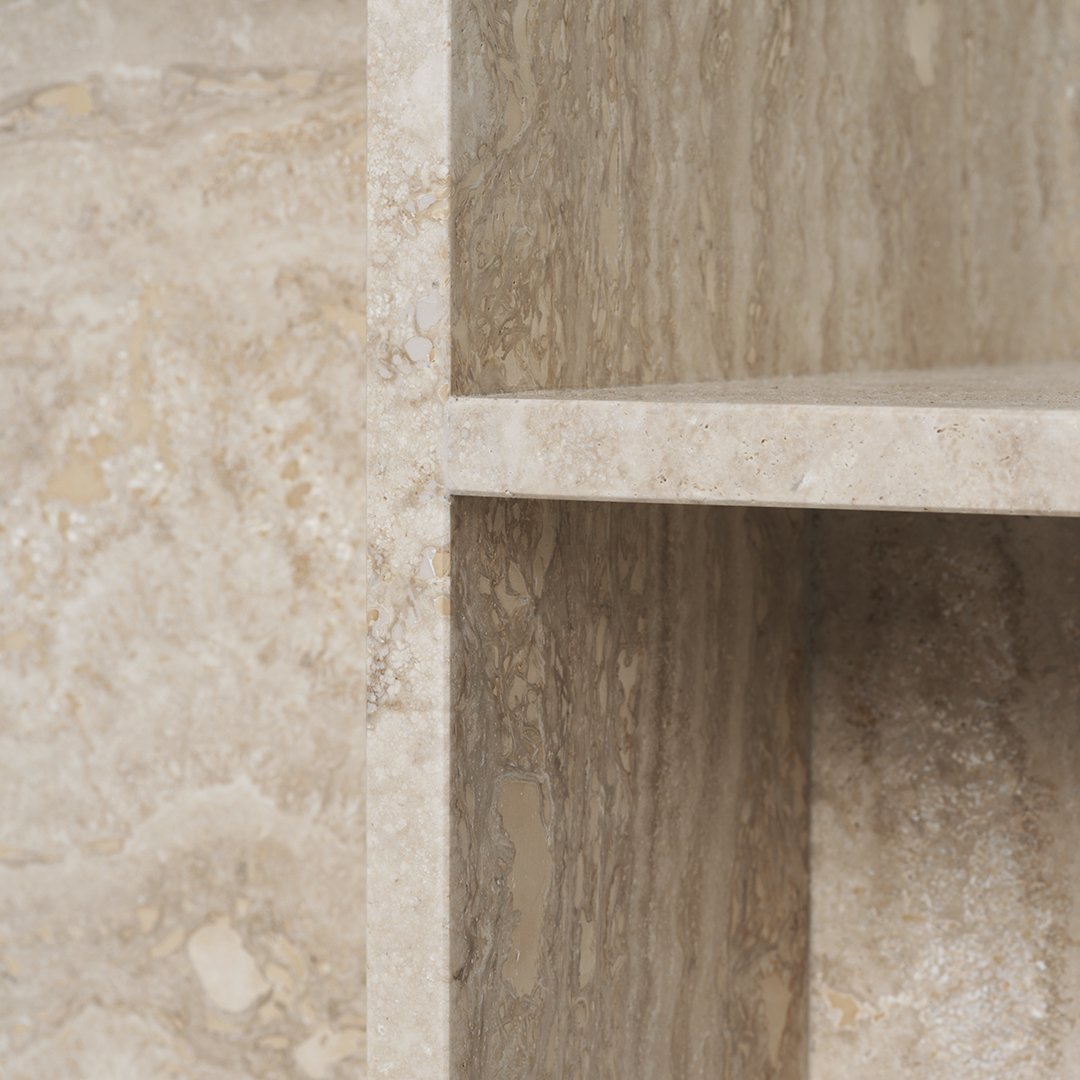 Light beige stone with subtle swirls and a textured pattern, showcasing a natural, elegant finish.