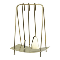 Gold metal fireplace tool set with a sleek, modern design and geometric patterns, ideal for stylish home decor.
