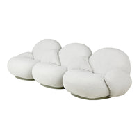 Textured white sofa with soft, rounded shapes and a minimalist design, perfect for modern living spaces.