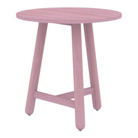 "Round pink side table with a smooth finish and light wood legs, perfect for modern decor."