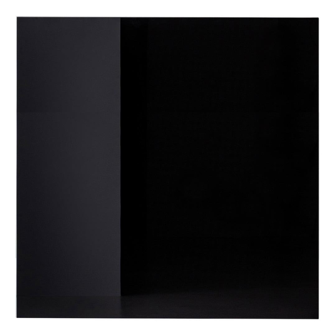 Solid black surface with a glossy finish, showcasing a sleek and modern aesthetic. Perfect for minimalist designs.
