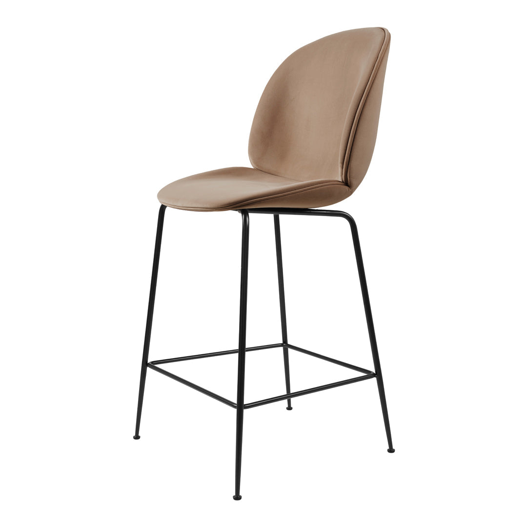 Stylish tan bar stool with a smooth, curved seat and sleek black metal legs. Modern design for any decor.