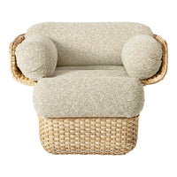 Beige textured upholstery with round cushions on a woven natural fiber base, offering a cozy, inviting aesthetic.