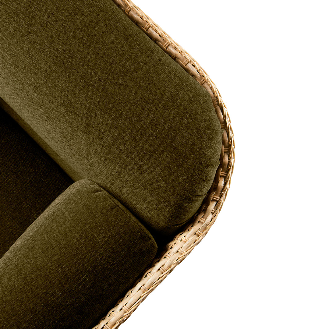 Olive green velvet fabric with natural woven accents, featuring a smooth texture and elegant design.
