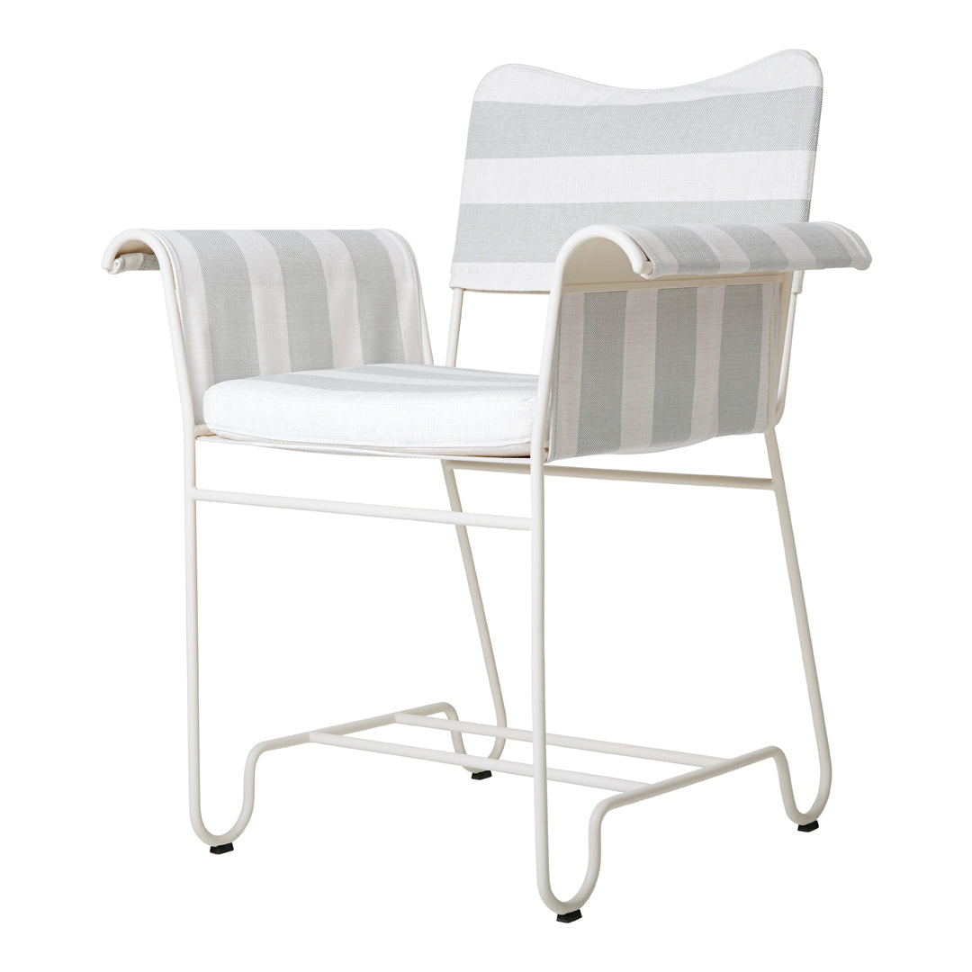 White and gray striped chair with sleek white metal frame, perfect for modern decor. 
