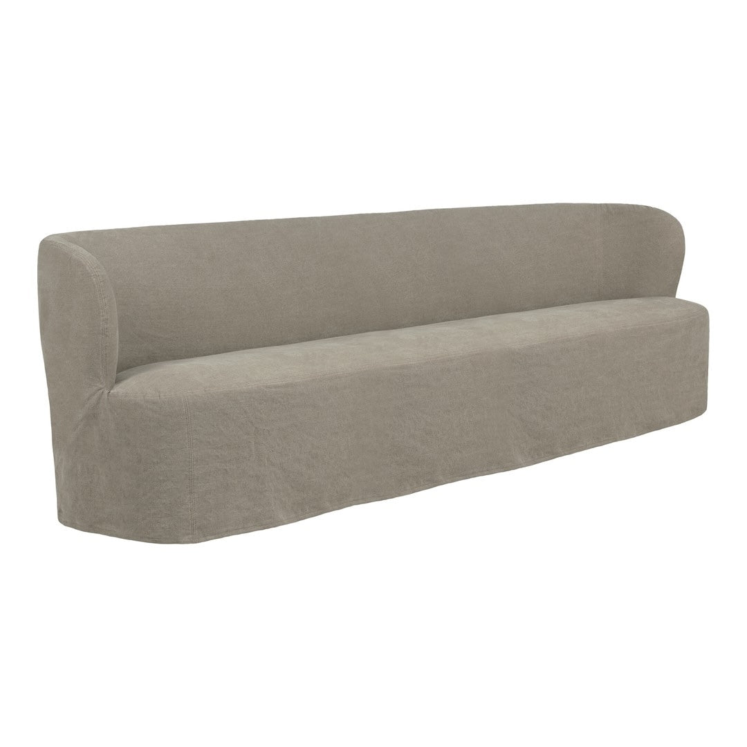 Beige curved sofa with smooth texture and minimalist design, perfect for modern home decor.