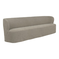 Beige curved sofa with smooth texture and minimalist design, perfect for modern home decor.