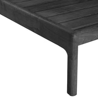 Sleek black wooden table with slatted design and rounded edges, ideal for modern decor.
