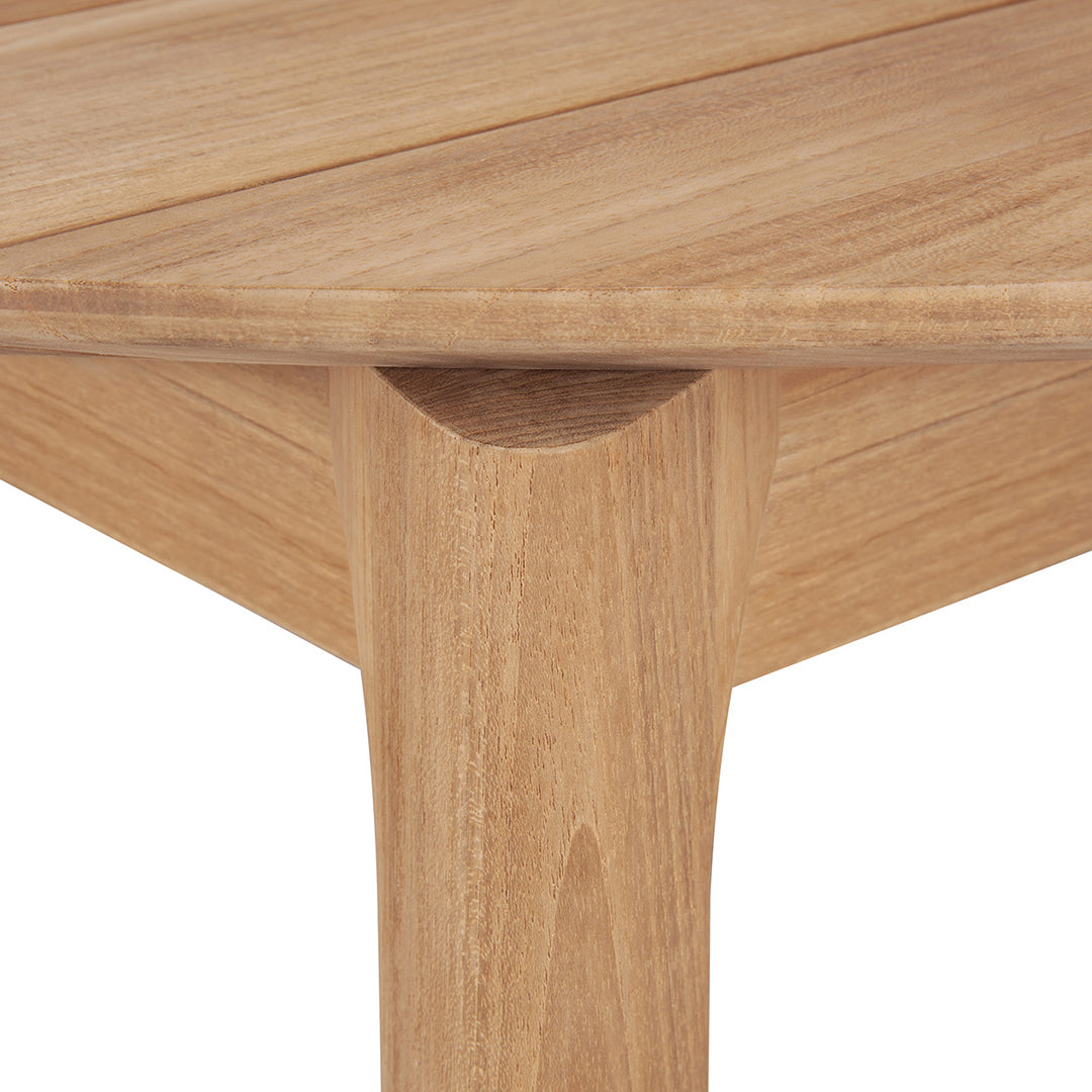 Natural wood grain with light brown tones and subtle textures, showcasing a sleek, modern design.
