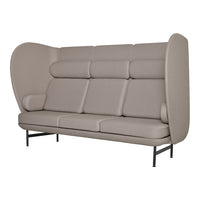 Beige high-back sofa with smooth upholstery and minimalist design, featuring subtle seams and a modern, stylish silhouette.