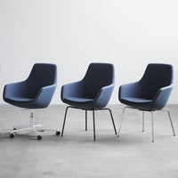 Modern navy blue chairs with sleek lines, featuring various leg styles, perfect for contemporary decor.