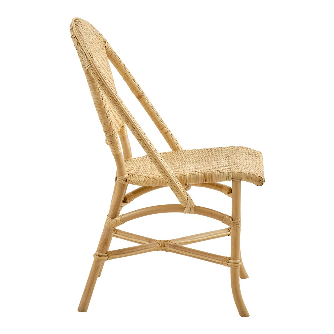 Natural rattan chair in a light beige color with woven seat and backrest, showcasing a simple, elegant design.