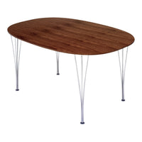 Oval wooden table with a warm walnut finish and sleek silver metal legs, featuring a minimalist design.