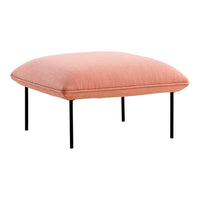 Soft coral pink upholstered ottoman with a smooth texture and black metal legs. Perfect for modern decor.