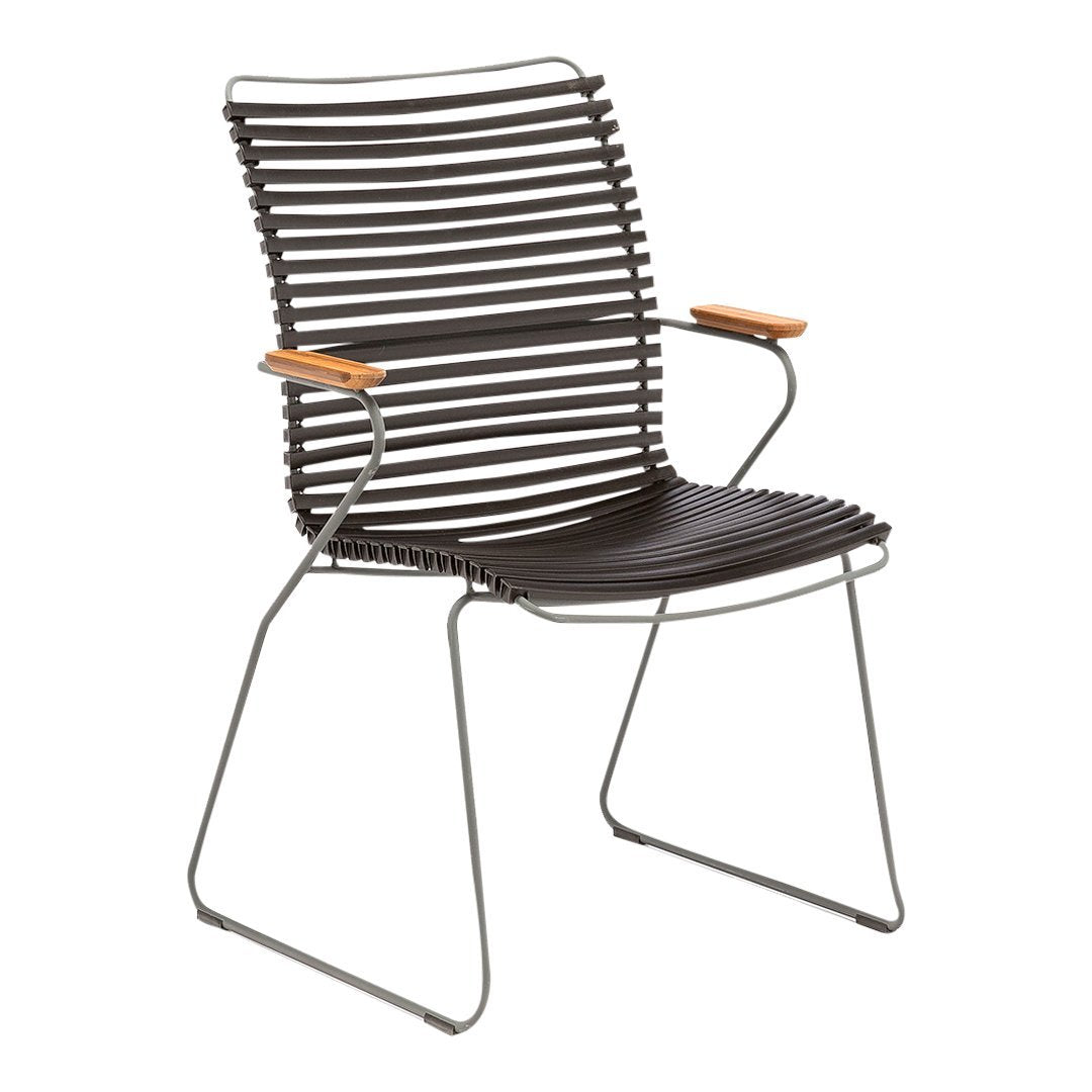 Black striped chair with a sleek metal frame and wooden armrests, featuring a modern, minimalist design.