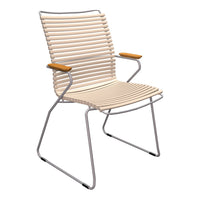 Beige striped chair with wood accents and a sleek silver frame, perfect for modern outdoor or indoor settings.