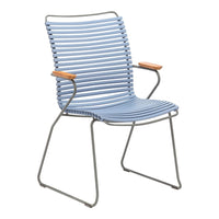 Light blue striped chair with natural wood armrests and a sleek metal frame. Modern and stylish design for any space.