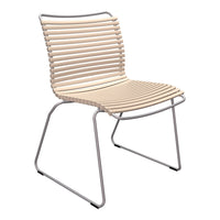 Beige slatted chair with a sleek silver frame, featuring a modern and minimalist design.