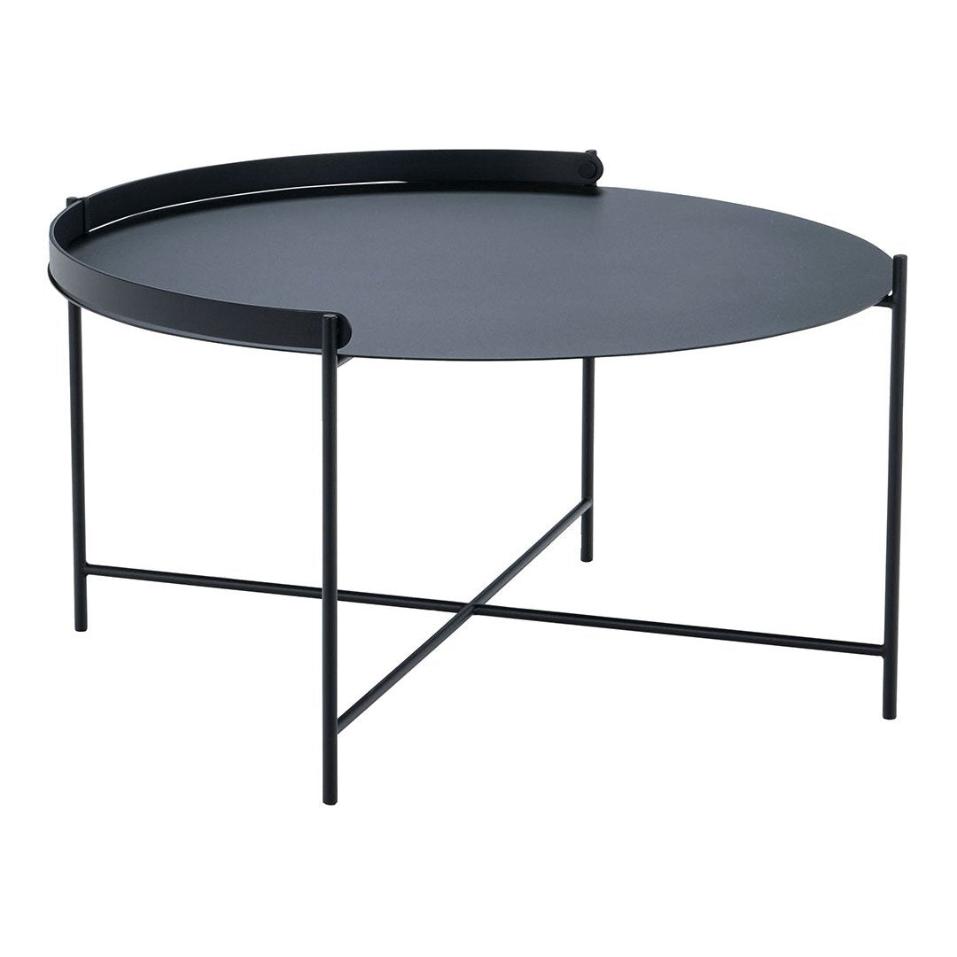 Black round coffee table with a minimalist design and smooth surface, featuring sleek metal legs.