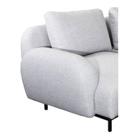 Soft grey fabric sofa with smooth, rounded edges and minimalist design. Ideal for modern living spaces.