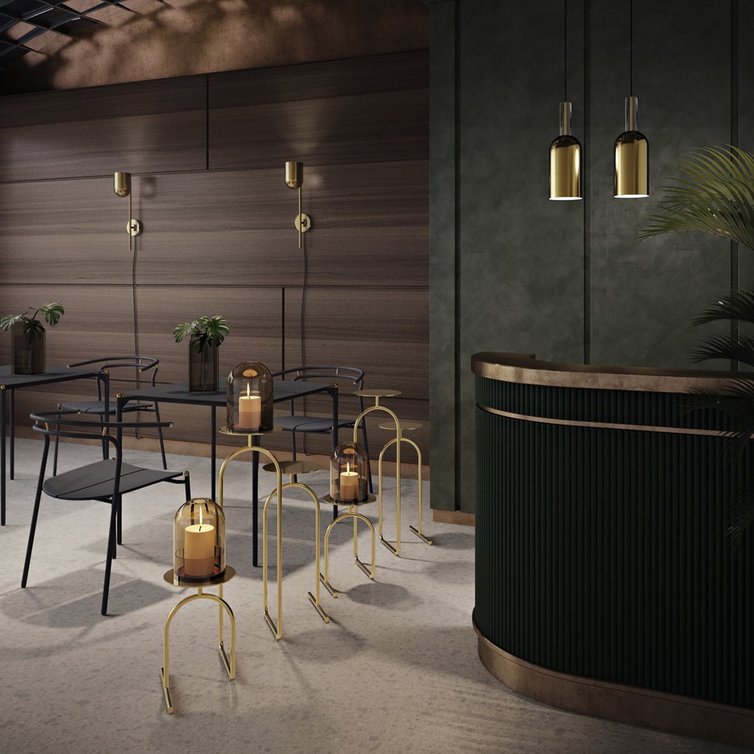 Elegant black furniture with gold accents and green textures, set against warm wood and matte surfaces.