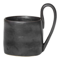 Stylish matte black ceramic mug with a sleek, modern design and unique curved handle. Perfect for any beverage.