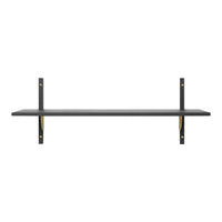Black shelf with gold accents and a minimalistic design. Perfect for modern interiors and stylish organization.