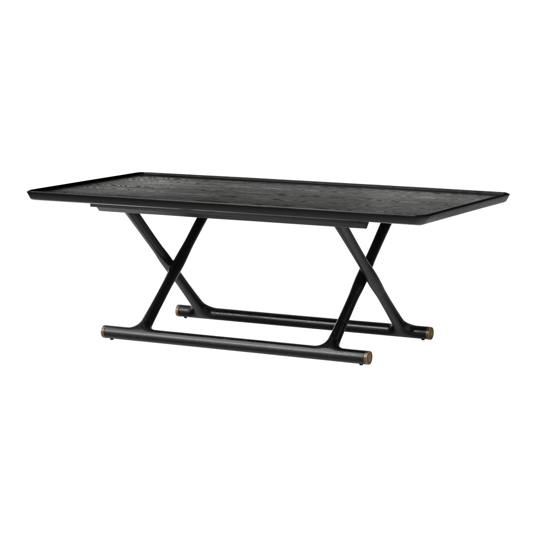 Black rectangular coffee table with a textured surface and metallic accents, featuring a modern minimalist design.