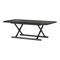 Black rectangular coffee table with a textured surface and metallic accents, featuring a modern minimalist design.