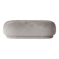 Soft gray velvet ottoman with a smooth, rounded design and minimalist aesthetic, perfect for modern decor.